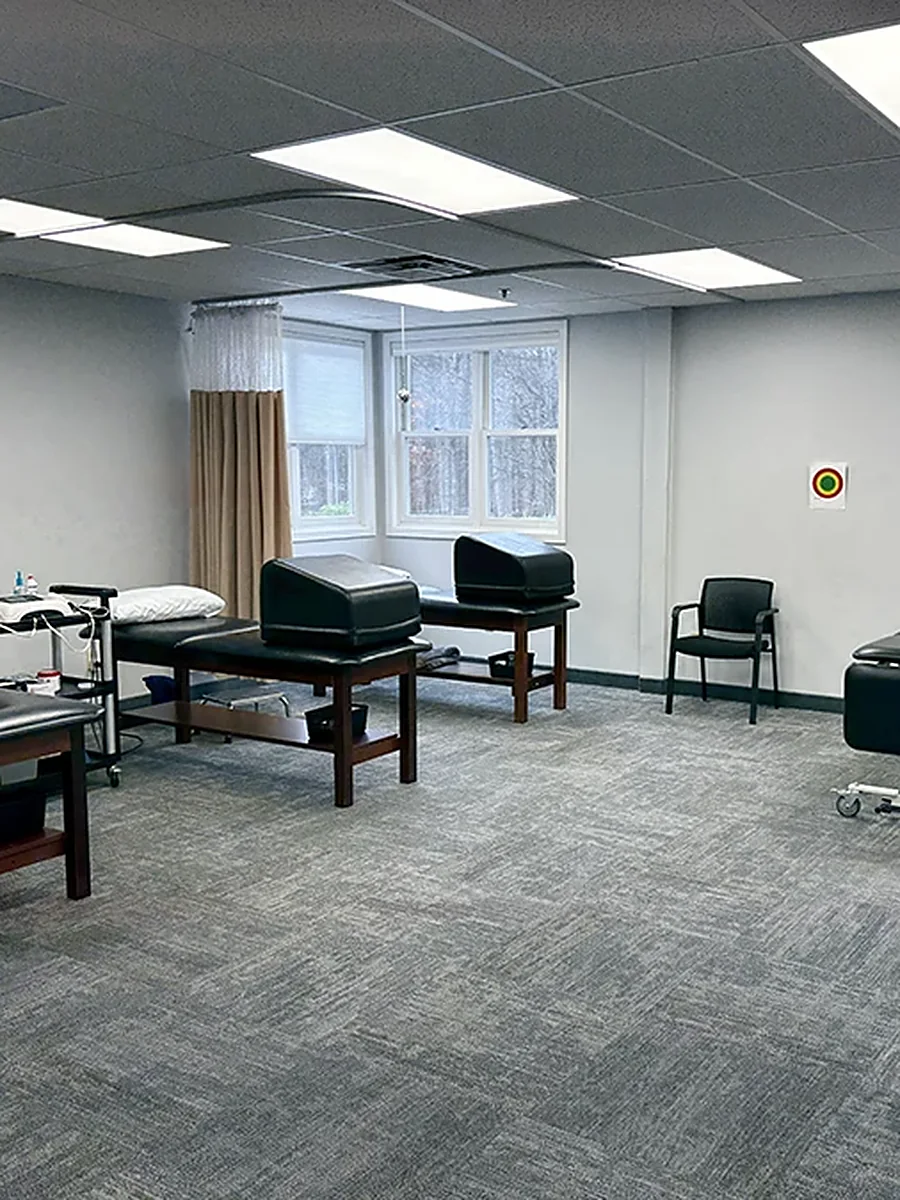 Treatment tables in the Denville, NJ clinic at Carroll Physical Therapy, where hands-on manual therapy is performed
